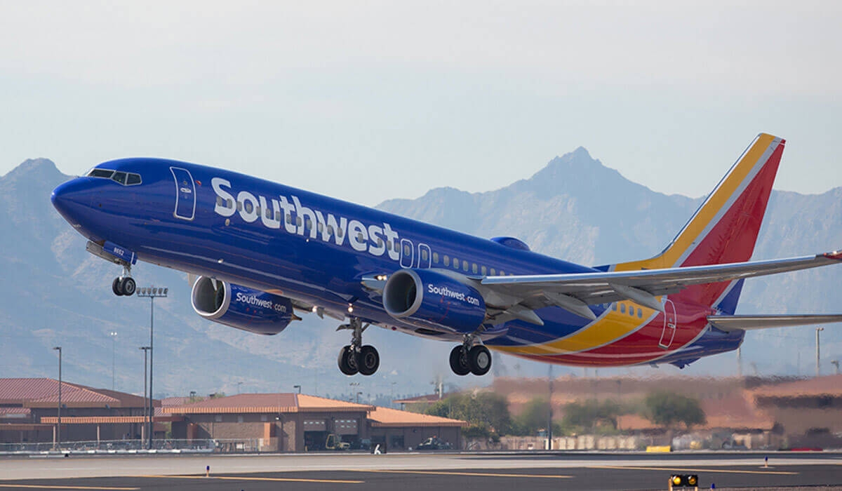 Southwest Air plane taking off - Chapel Hill Tire