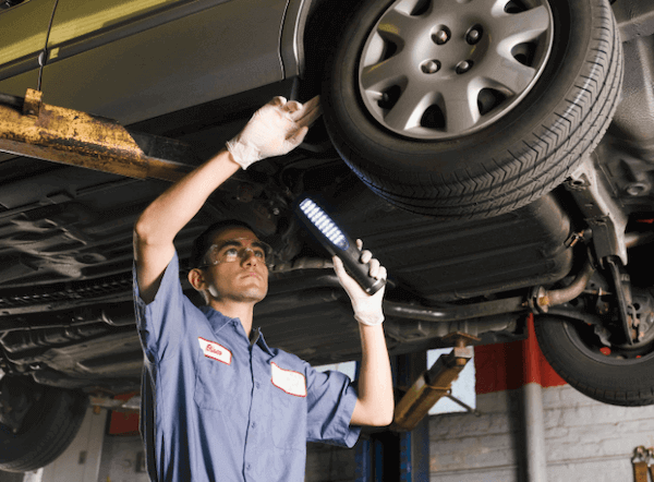 Mechanic completing a tire inspection