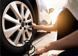 Woman fills up a tire