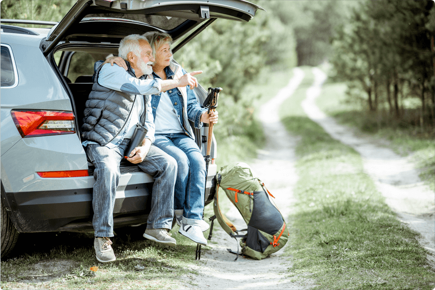 Seniors driving in nature